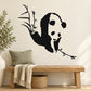 Panda bear wall decal with bamboo branches, black and white panda face and leaves
