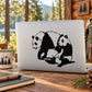 Black mother and baby panda decal on light surface