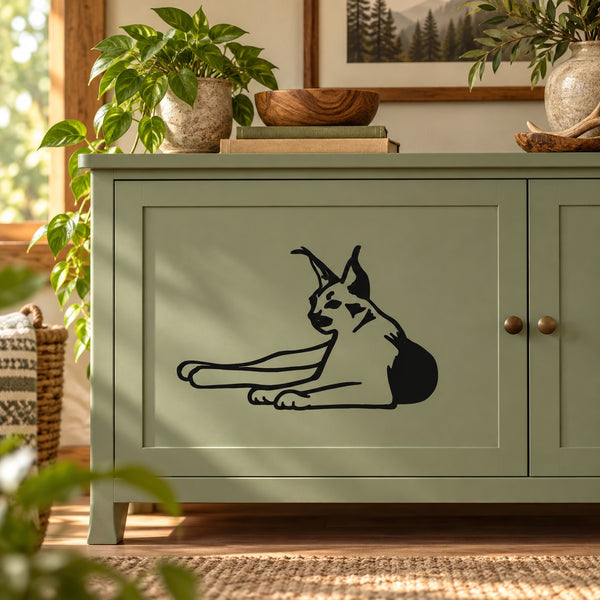 Reclining lynx decal sticker with black silhouette