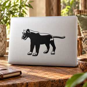 Panther observing decal with black panther silhouette on light laptop lid