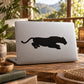 Panther pouncing decal, black silhouette on a light laptop lid
