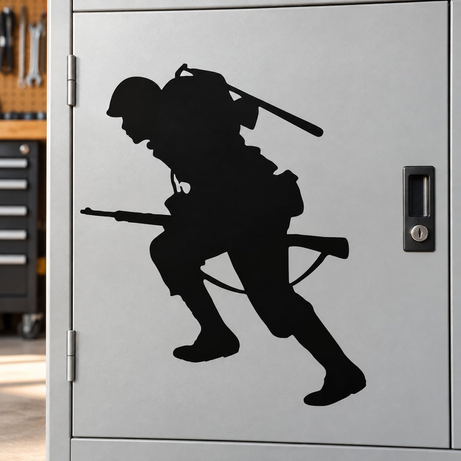 Running soldier silhouette decal, black design on a rectangular surface