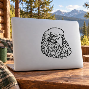 Eagle head decal with black line-art on a light surface