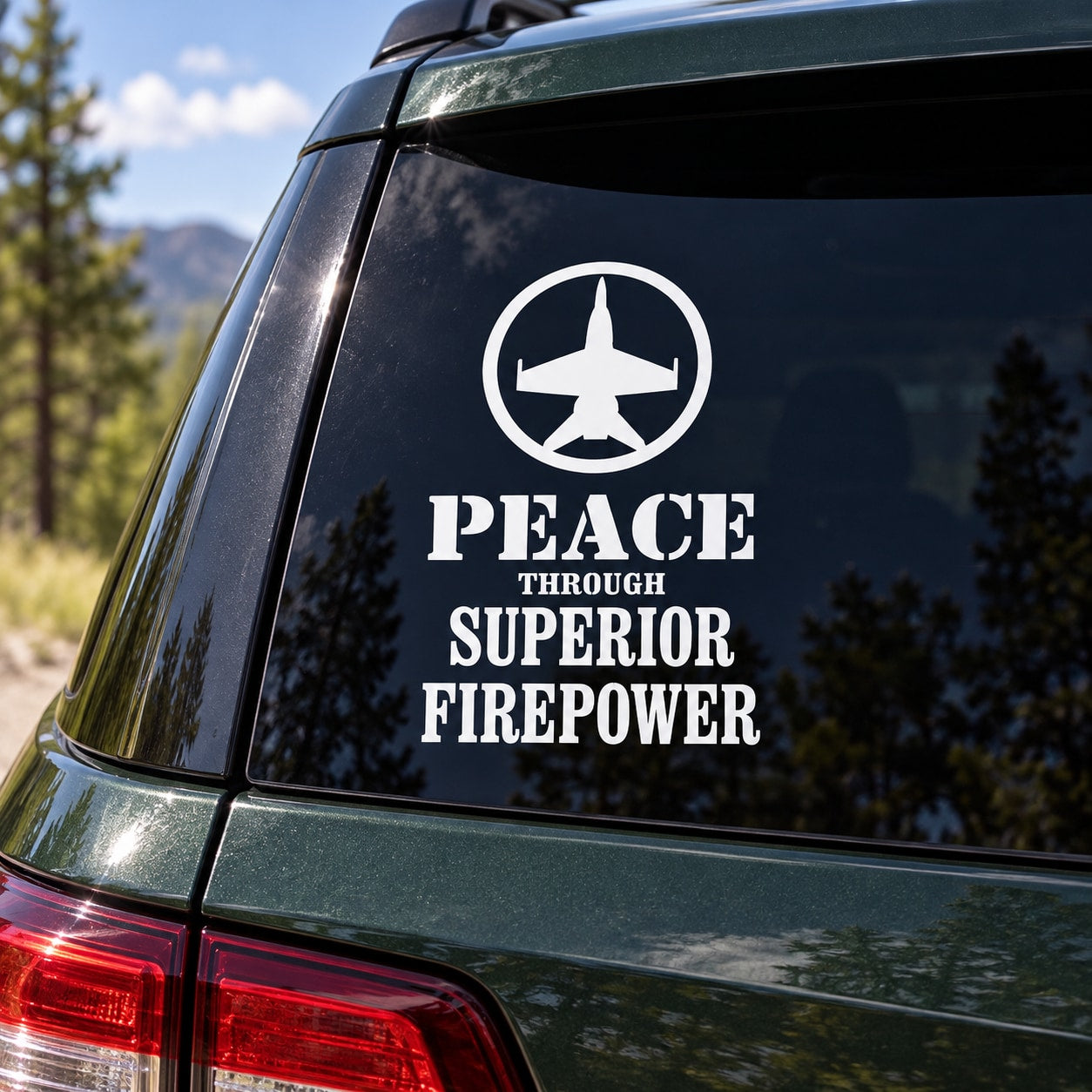 White airplane peace symbol vehicle decal: 'PEACE THROUGH SUPERIOR FIREPOWER'