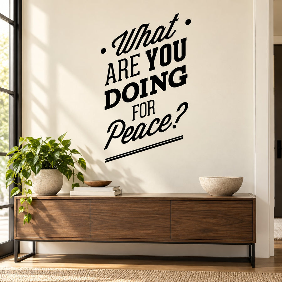 Wall decal text in black: 'What are you doing for Peace?'