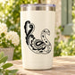 Decorative peacock decal, black feathered bird design on light background