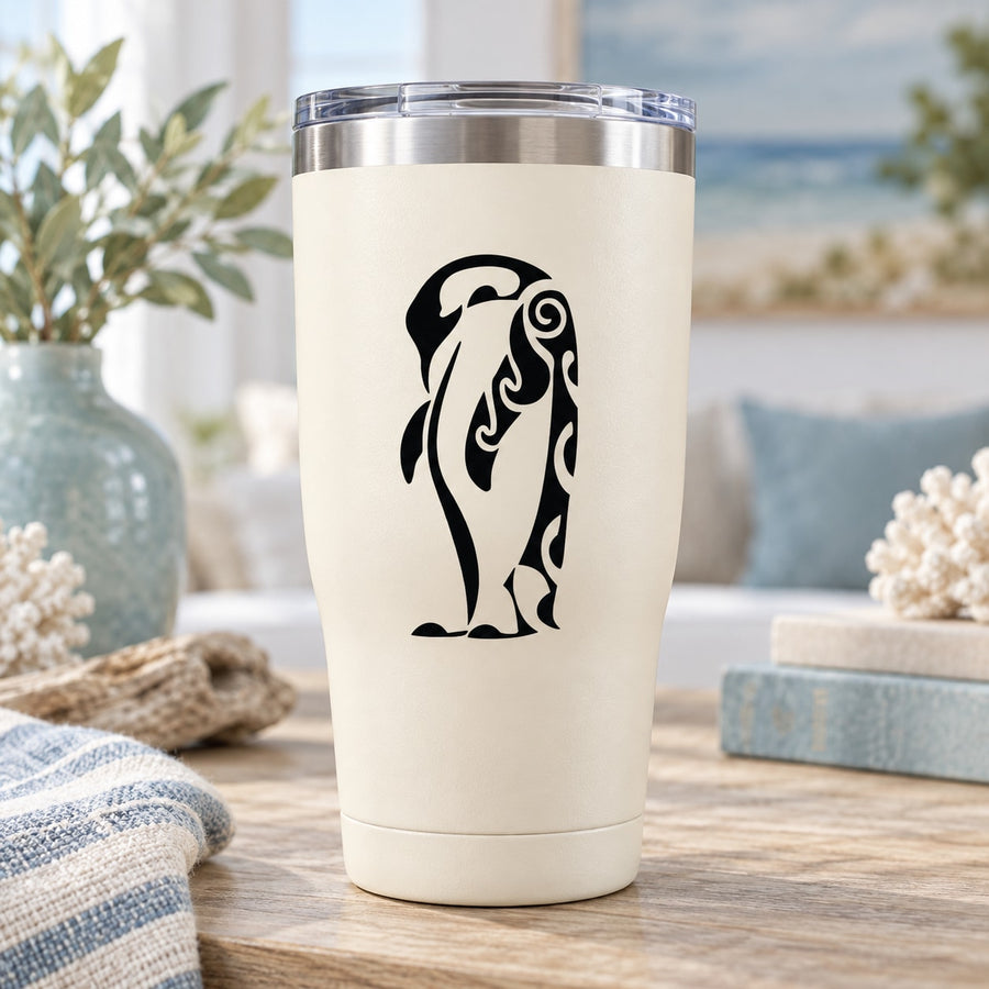 White tumbler with black huddled penguin decal