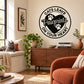 Wall decal with circular cat paw-print design and 'Cats Leave Pawprints on Your Heart' text