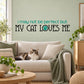 Cat-themed wall decal with text "My cat loves me" and paw print heart
