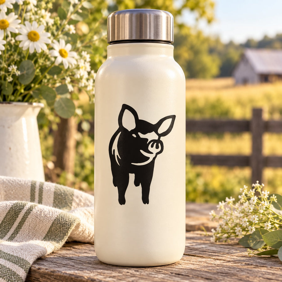 White bottle with black pig decal, metal lid