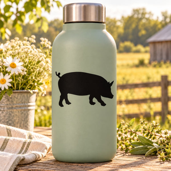 Pig silhouette decal, black on a pale bottle