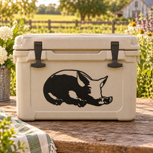 Resting pig decal sticker with black silhouette on white backing