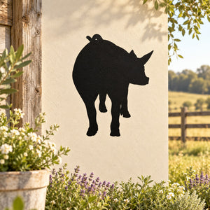 Pig silhouette wall decal, black cutout of hind pig on light background