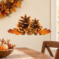 Autumn pinecone and leaf printed wall decal with two pinecones at center
