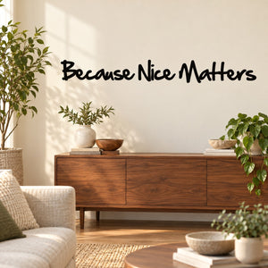 Wall decal with "Because Nice Matters" black script lettering