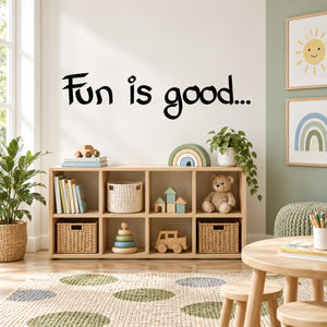 Black handwritten wall decal text: "Fun is good..."