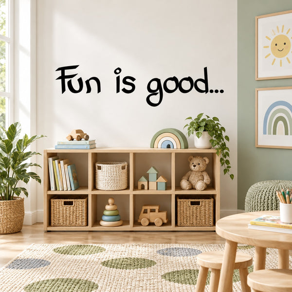 Black handwritten wall decal text: "Fun is good..."