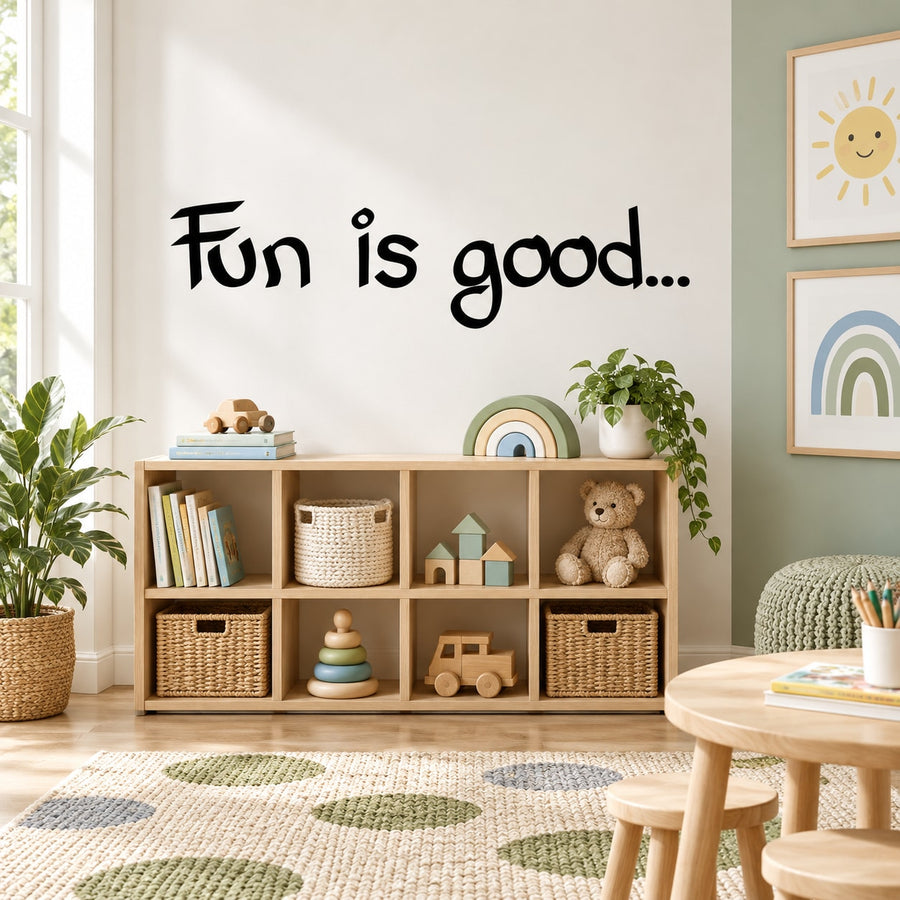 Black handwritten wall decal text: "Fun is good..."