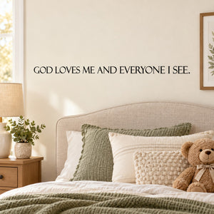 Wall decal with the text “GOD LOVES ME AND EVERYONE I SEE.”