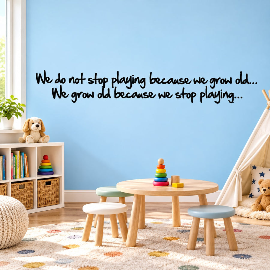 Wall decal with quote text: “We do not stop playing because we grow old…”