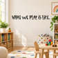 Inspirational wall decal reading 'WHAT WE PLAY IS LIFE.'