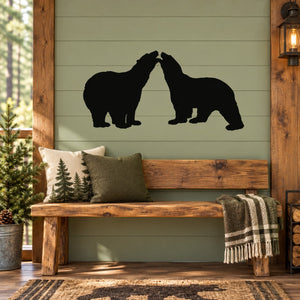 Black polar bear decal with two bears walking silhouettes on a wall