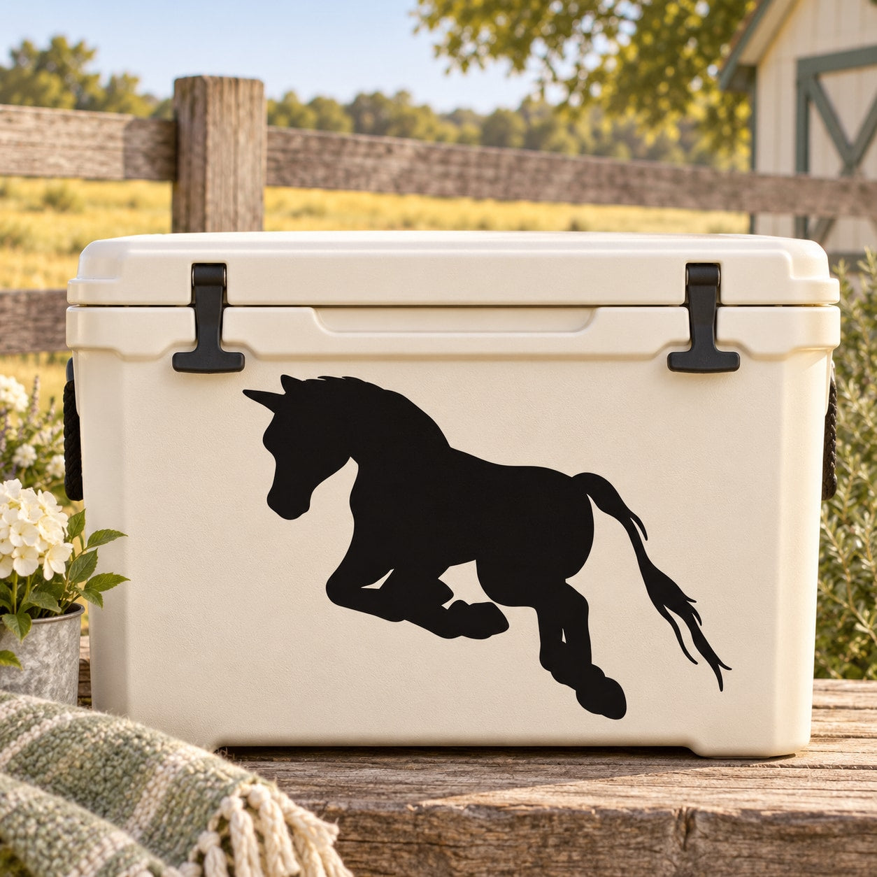 Black leaping pony silhouette decal on a white rectangular cooler lid