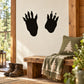 Black animal track decal with two paw print hand silhouettes