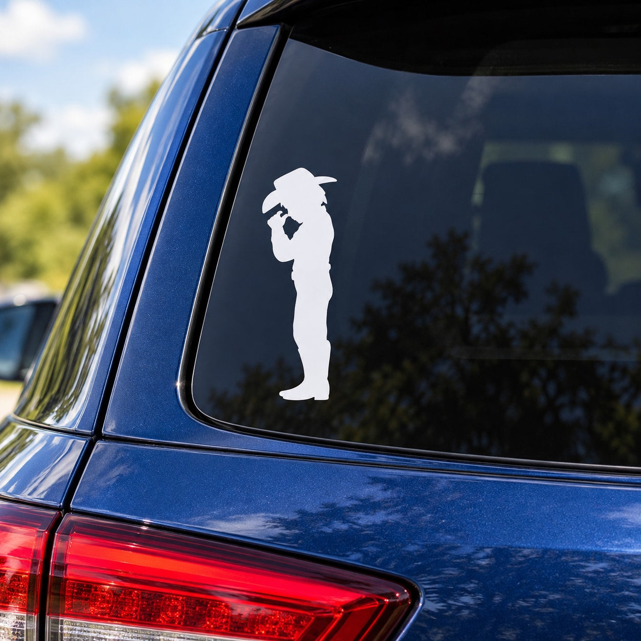 White cowboy praying silhouette decal on car window