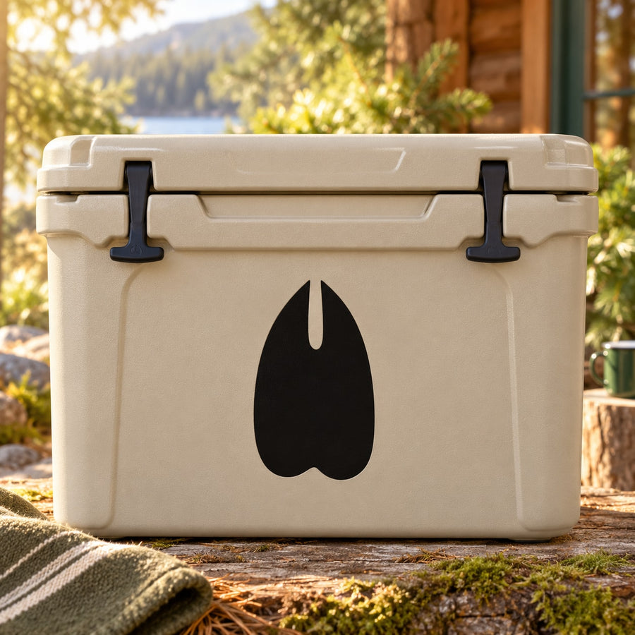 Black sheep track decal, droplet-shaped, on light cooler