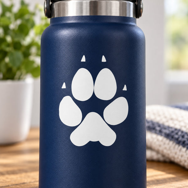 Dog paw print decal, white on blue surface