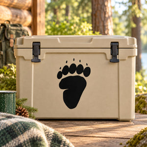 Bear paw track decal with black paw print on a light-colored cooler