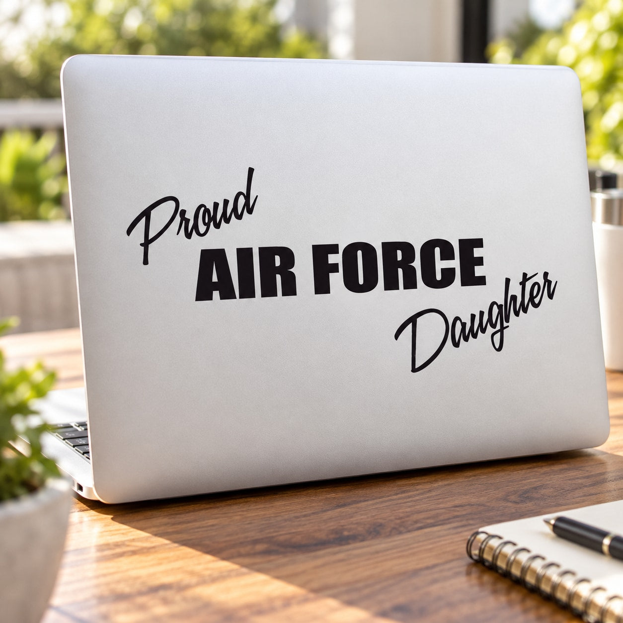 Vinyl decal with black “Proud Air Force Daughter” script lettering