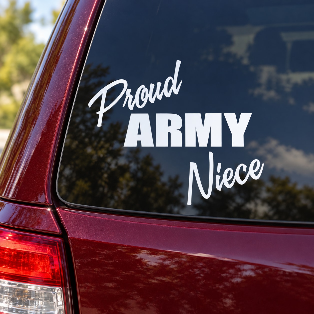 Car window decal with white 'Proud ARMY Niece' text