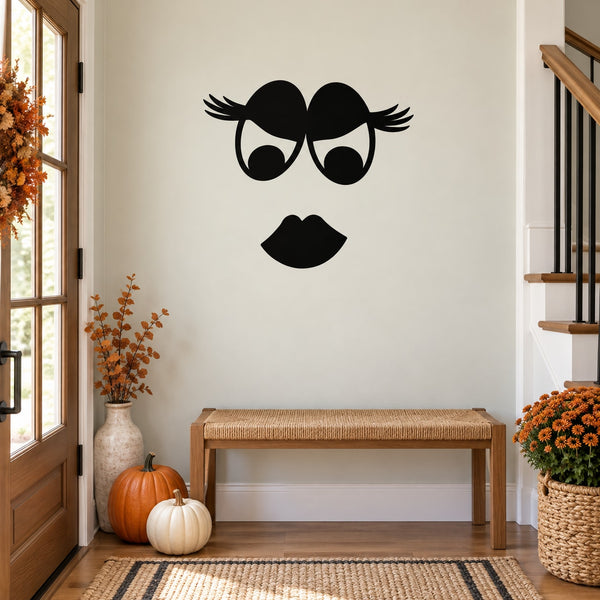 Evil witch face wall decal with black cartoon eyes, nose, and mouth