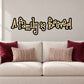 Outlined wall decal with 'A Family is forever!' in black and gold script