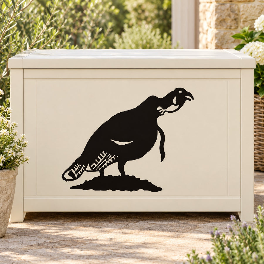 Black quail territorial wall decal with beak open on a light surface