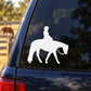White quarter horse with walking rider decal on car window