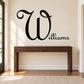 Family name wall decal with large cursive “Williams” lettering in black