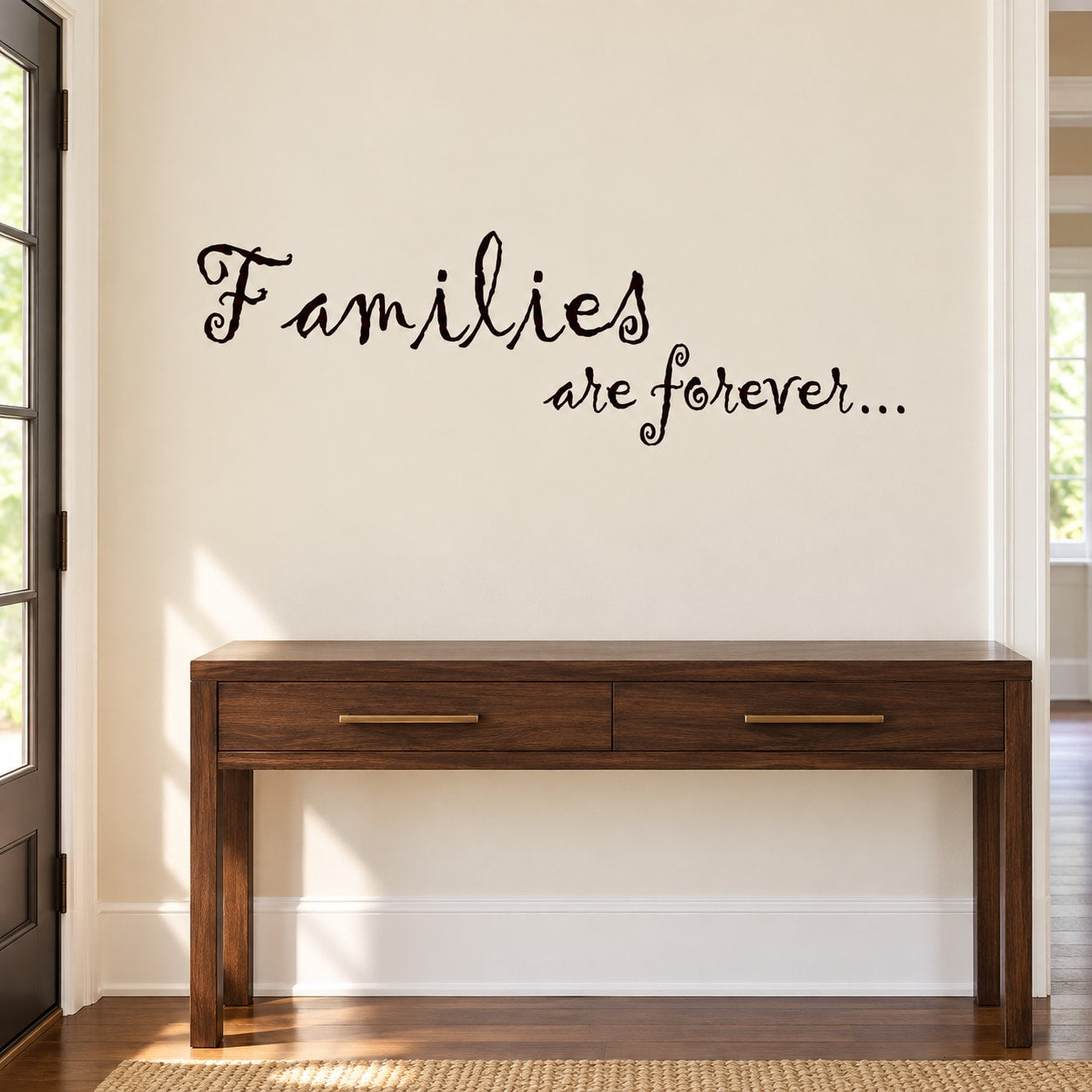 Cursive wall decal reading "Families are forever" in black lettering