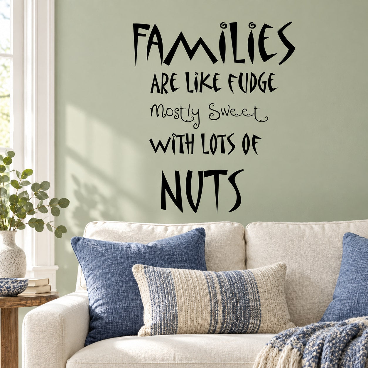Black wall decal text: Families are like fudge, mostly sweet with lots of nuts