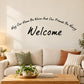Wall decal: cursive “Welcome” with “May our home be warm…” text