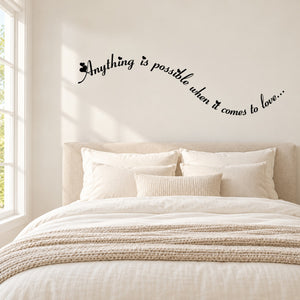 Cursive wall decal with black text, 'Anything is possible when it comes to love'