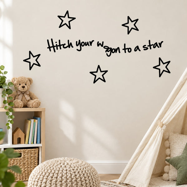 Wall decal with star outlines and handwritten quote 'Hitch your wagon to a star'