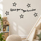 Wall decal with star outlines and handwritten quote 'Hitch your wagon to a star'