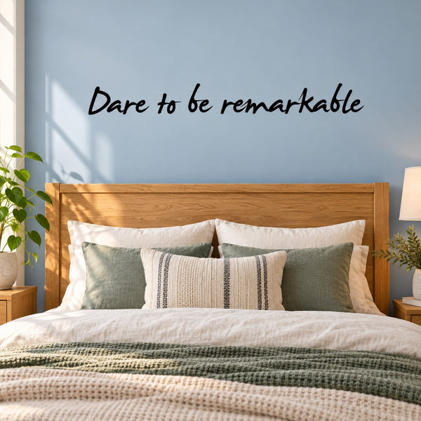 Wall decal with script text 'Dare to be remarkable'