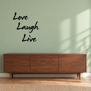 Black cursive wall decal: “Love Laugh Live” lettering