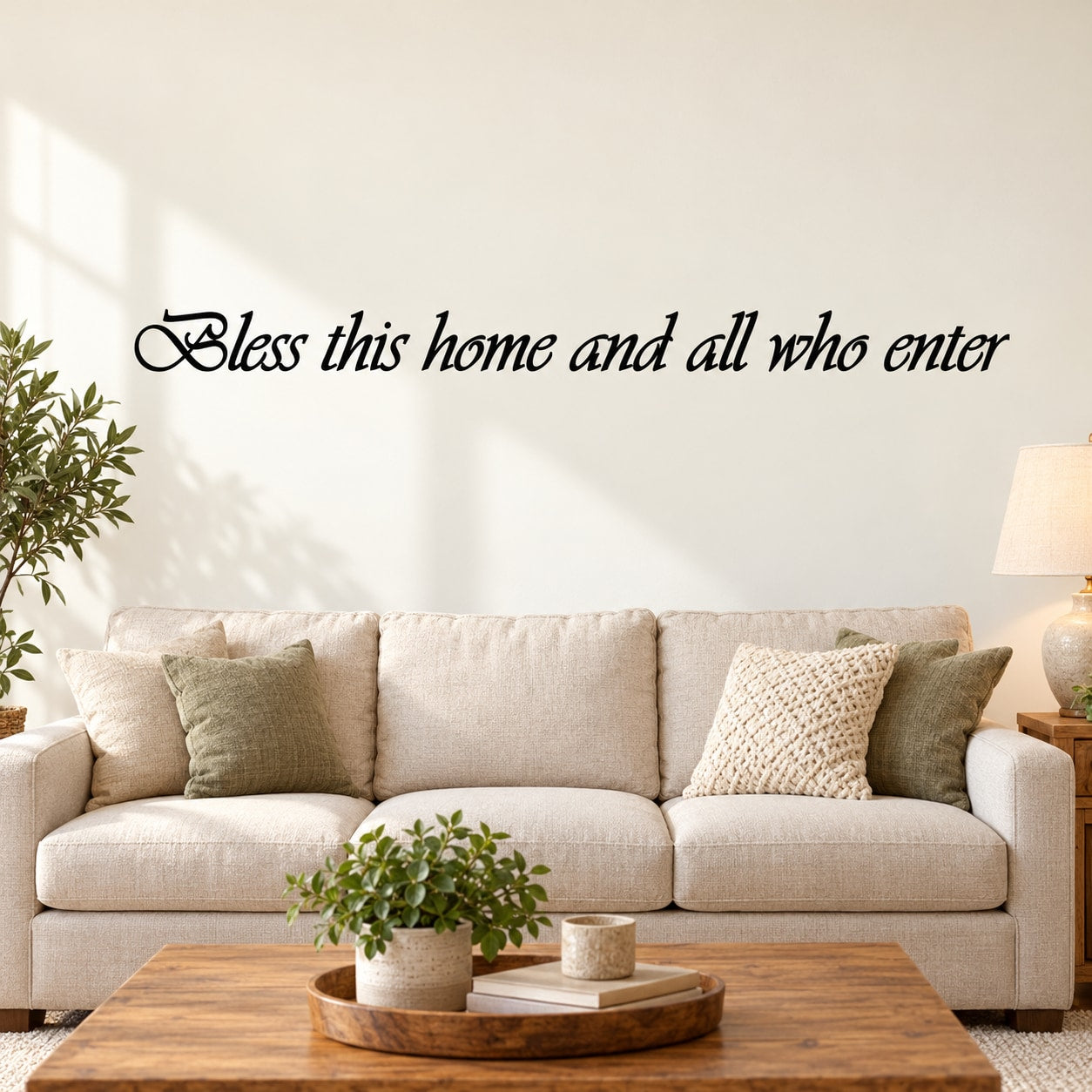 Script wall decal reading 'Bless this home and all who enter'