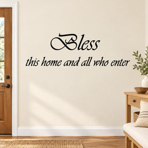 Wall decal with cursive "Bless this home and all who enter" lettering
