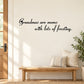Wall decal with script text: “Grandmas are moms with lots of frosting.”